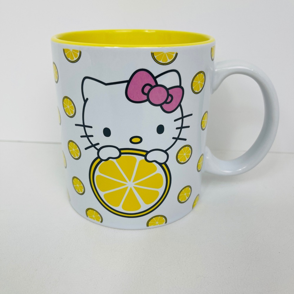Hello Kitty Mug 20 oz Silver Buffalo White Yellow Lemon Citrus Sanrio Excellent